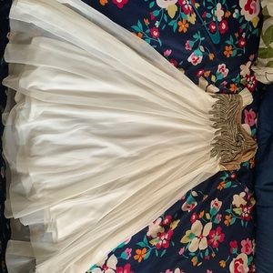 Long formal white dress for girls from 9-12, with purple gemstones on bust